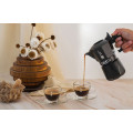 Compact black Bialetti 2 Cup Moka Brikka serving two espressos.