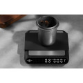 MHW Formula Smart Coffee Scale Black, versatile coffee weight scale in a coffee brewing setup.  