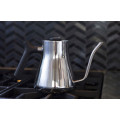 Fellow 1lt Stagg kettle with steam rising during coffee brewing.