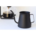 Hario Mini 300ml Drip Kettle - Pouring hot water over coffee grounds.