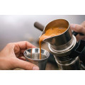 Modern 9Barista espresso machine showcasing premium stainless steel. pouring an espresso.