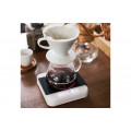 Acaia Pearl Coffee Scale: White displayed next to brewing coffee setup.  
